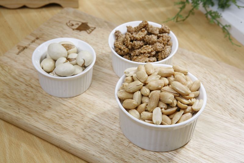 Bowl of roasted nuts with nutty texture, similar to cooked jackfruit seeds